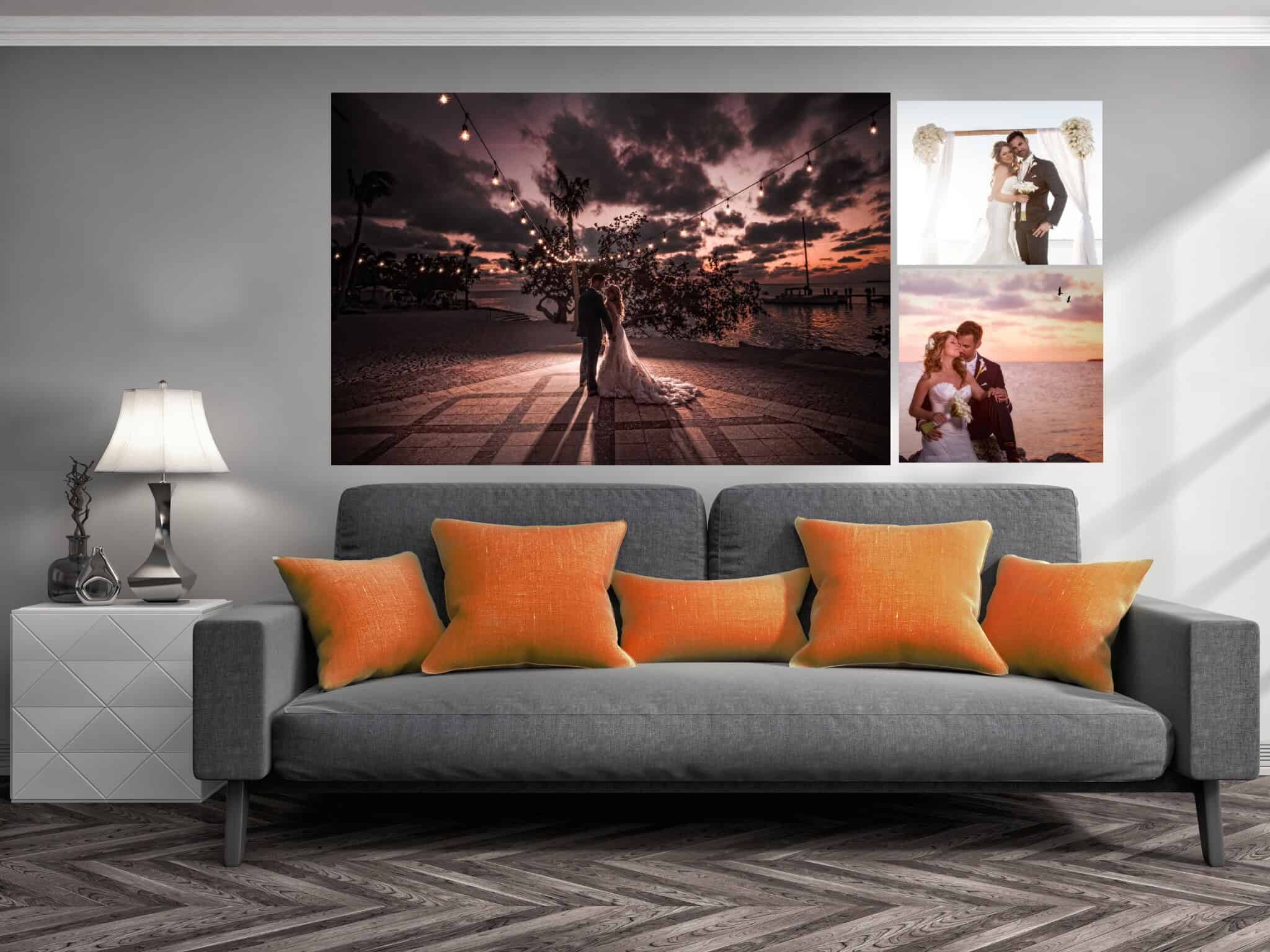 Three framed wedding prints displayed above a grey sofa in a living room